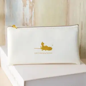 Trousse argentée Kiki vole